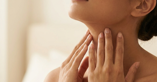 Applying Aloe Ferox Neck Cream in an upward motion
