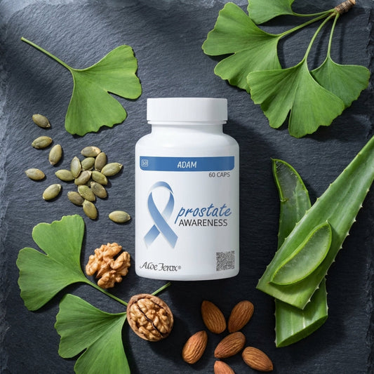 Supplement bottle labeled 'prostate awareness' surrounded by nuts and leaves on a dark surface