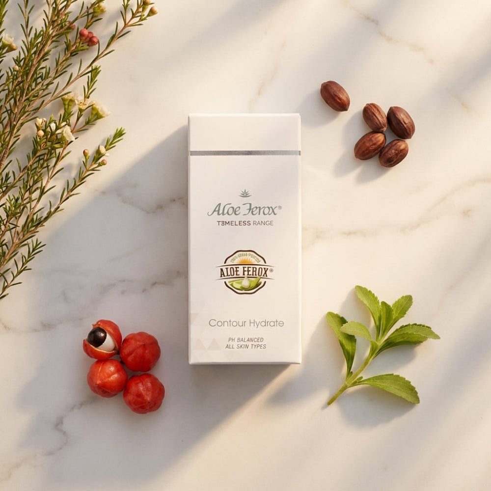 Aloe Ferox contour hydrate skincare product packaging on a marble surface with natural elements.