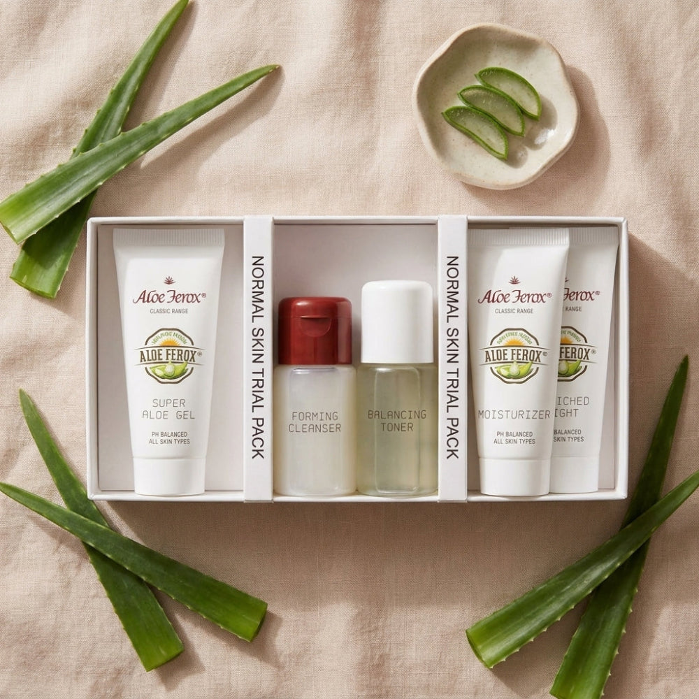 Aloe Ferox skincare trial pack normal skin  with aloe ferox leaves on a beige background
