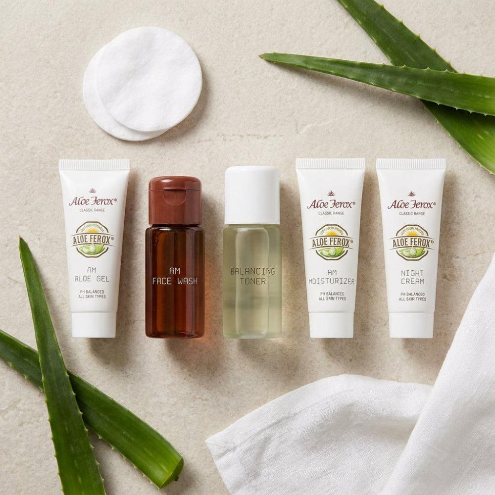 Set of Aloe Ferox oily skin trial pack skincare products on a beige background with aloe ferox leaves.